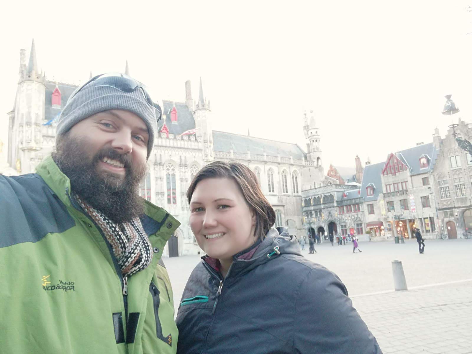 Owner and her spouse on the square in Bruge, Belgium.